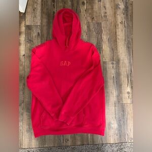 Women’s gap hoodie. Looks red on camera but it’s more of a vibrant pink/red